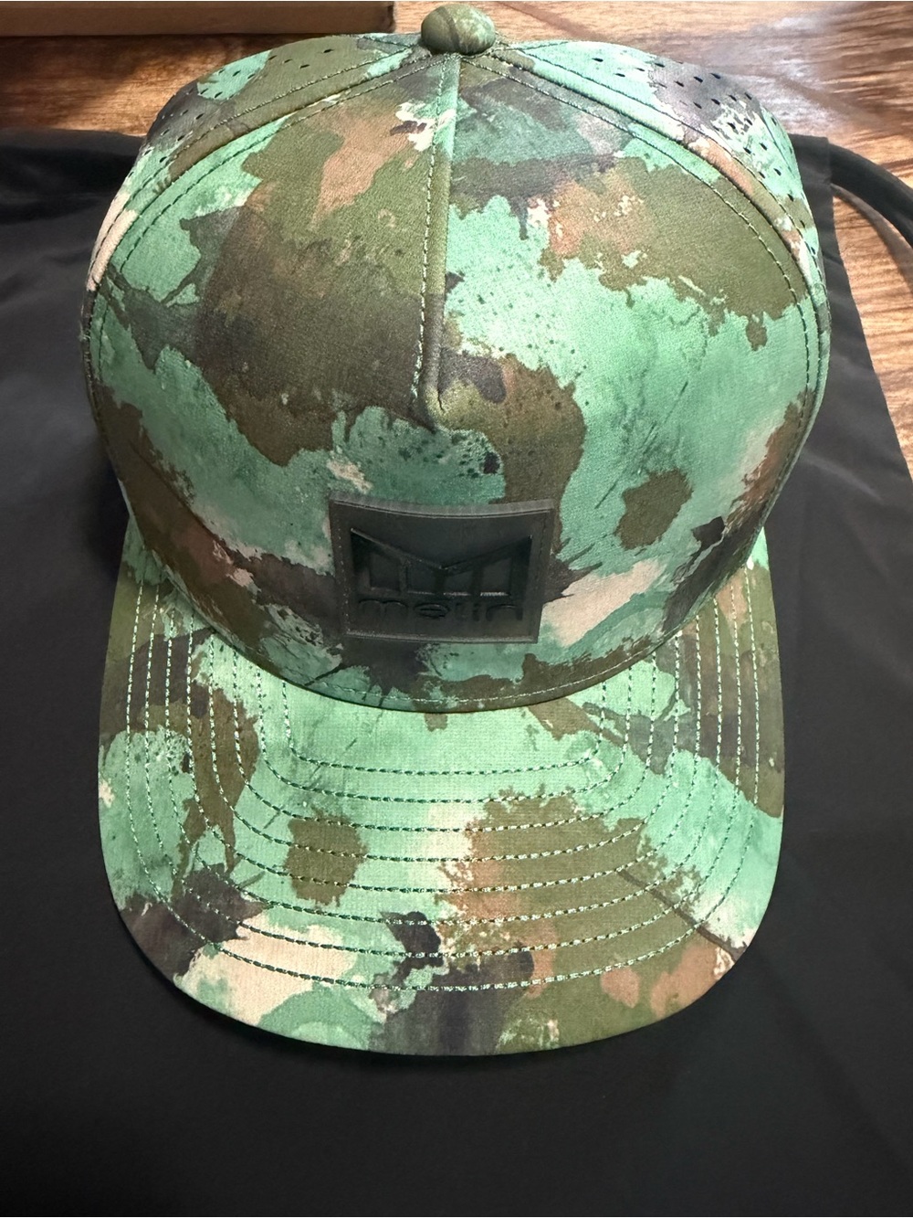 Melin Green Watercolor Camo Snapback Hat with Black Logo Patch